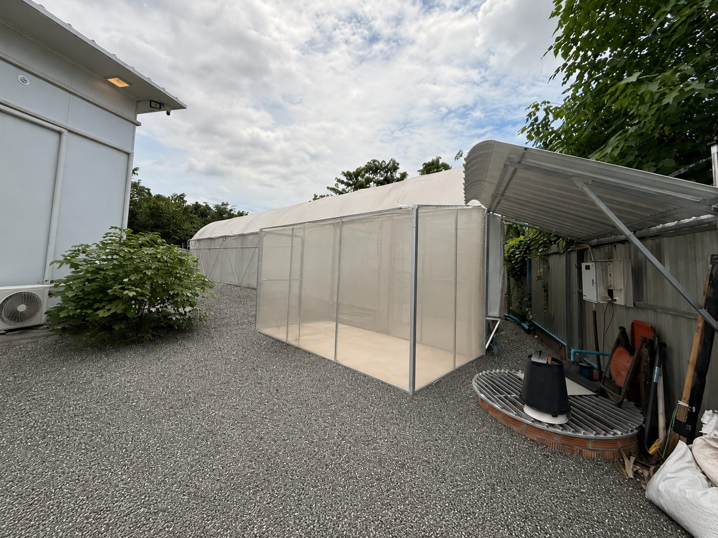Exterior of a production-style structure attached to the main building