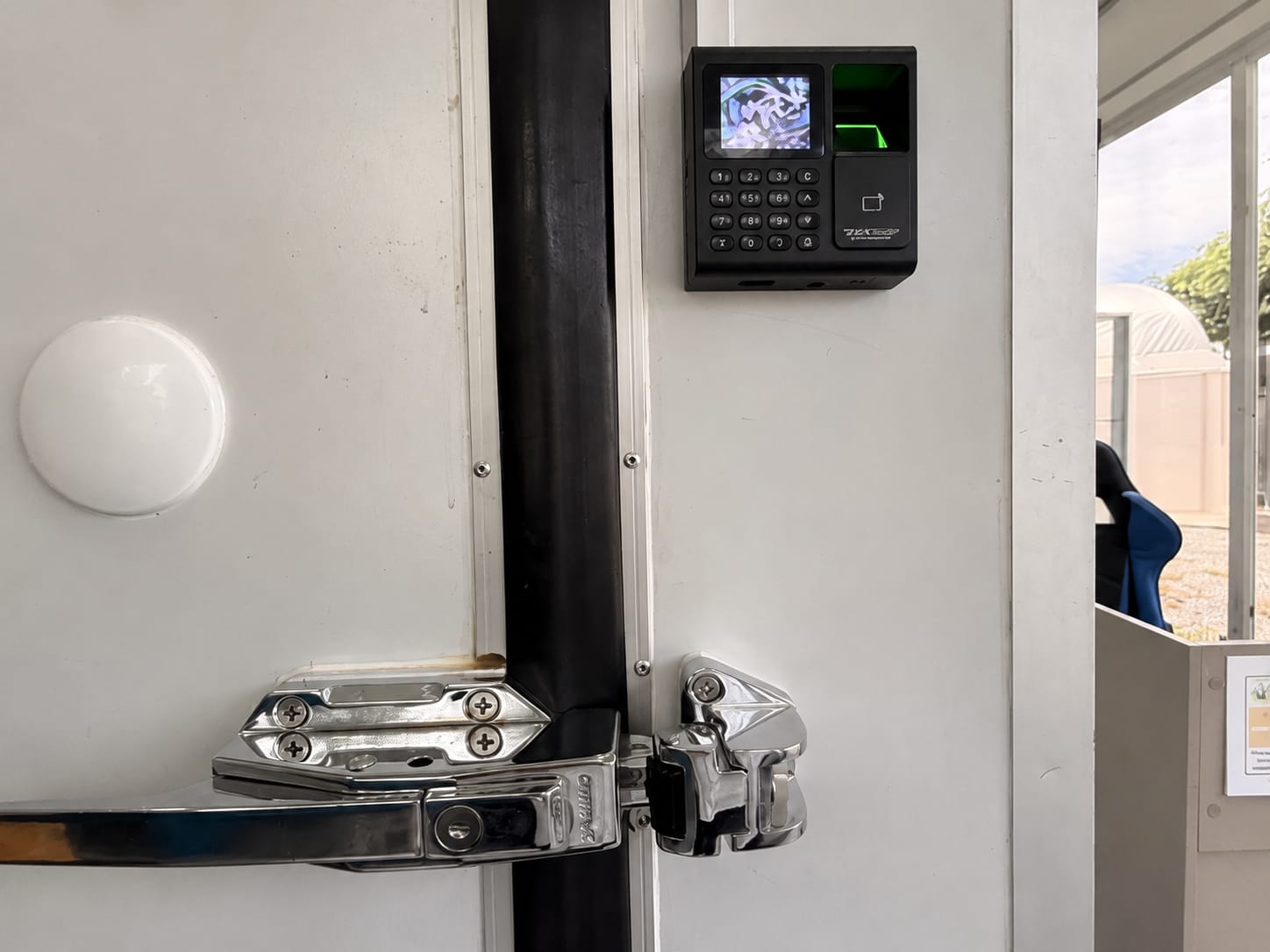 Close-up of the access control and door hardware